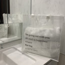 クリアバッグ（英字柄、39cm×41cm×15cm）